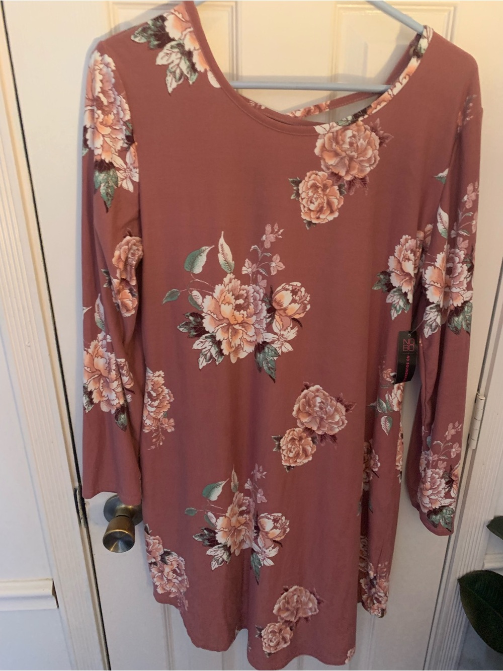 Mauve  long-sleeve dress from No Boundaries featuring an all-over flowers